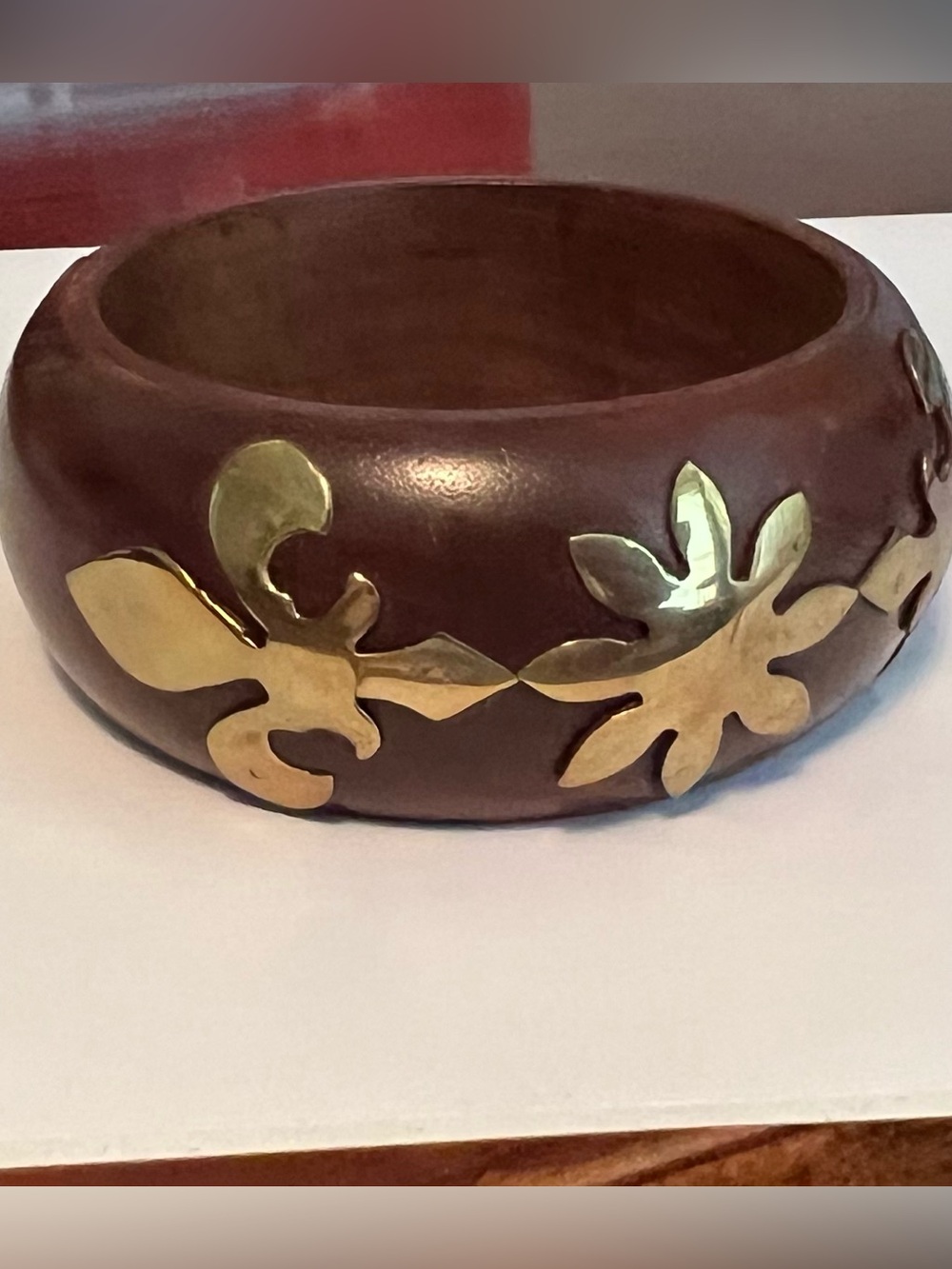 Brown Wood Bangle with Gold Floral Inlay
Eye catching and vintage